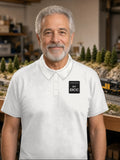 Powered By DCC Cotton Polo – Light – White (embroidered in black thread)